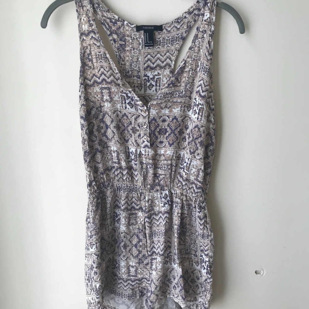 Adorable Aztec print button down romper